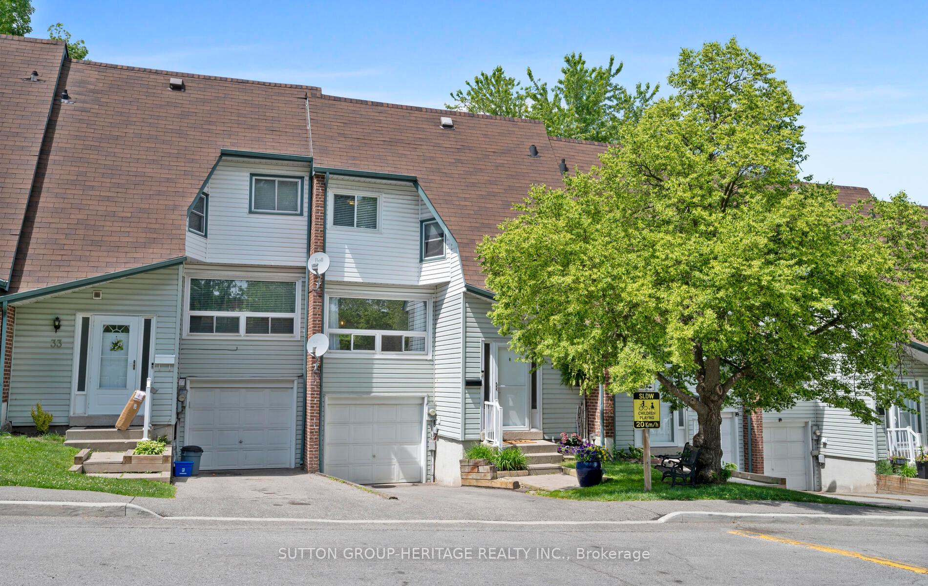 Photo 1 of Unit 32, 909 King Street W, Oshawa, Vanier — HOMEH