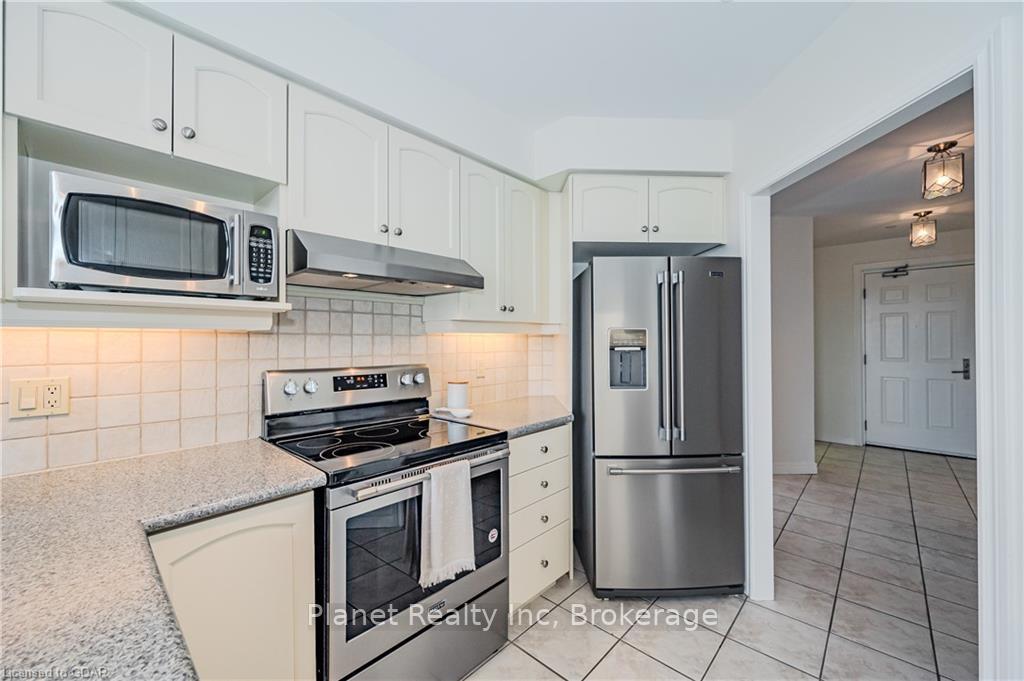 Photo 13 of Unit 407, 65 Bayberry Drive, Guelph, Village By The Arboretum — HOMEH