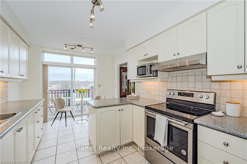 Photo 14 of Unit 407, 65 Bayberry Drive, Guelph, Village By The Arboretum — HOMEH