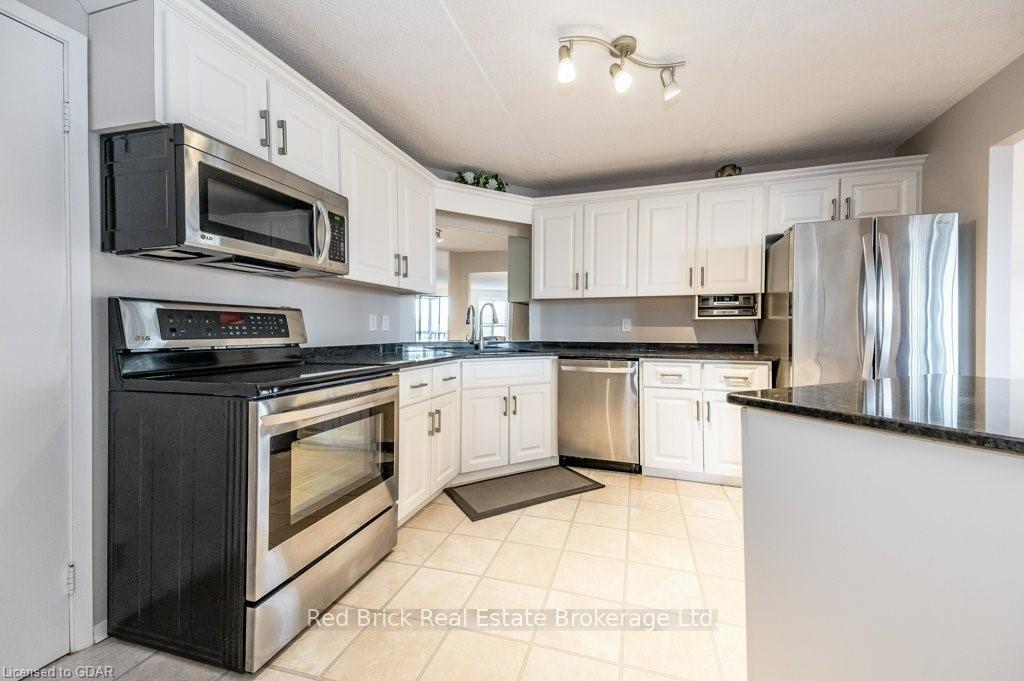 Photo 11 of Unit 404, 22 Marilyn Drive, Guelph, Riverside Park — HOMEH