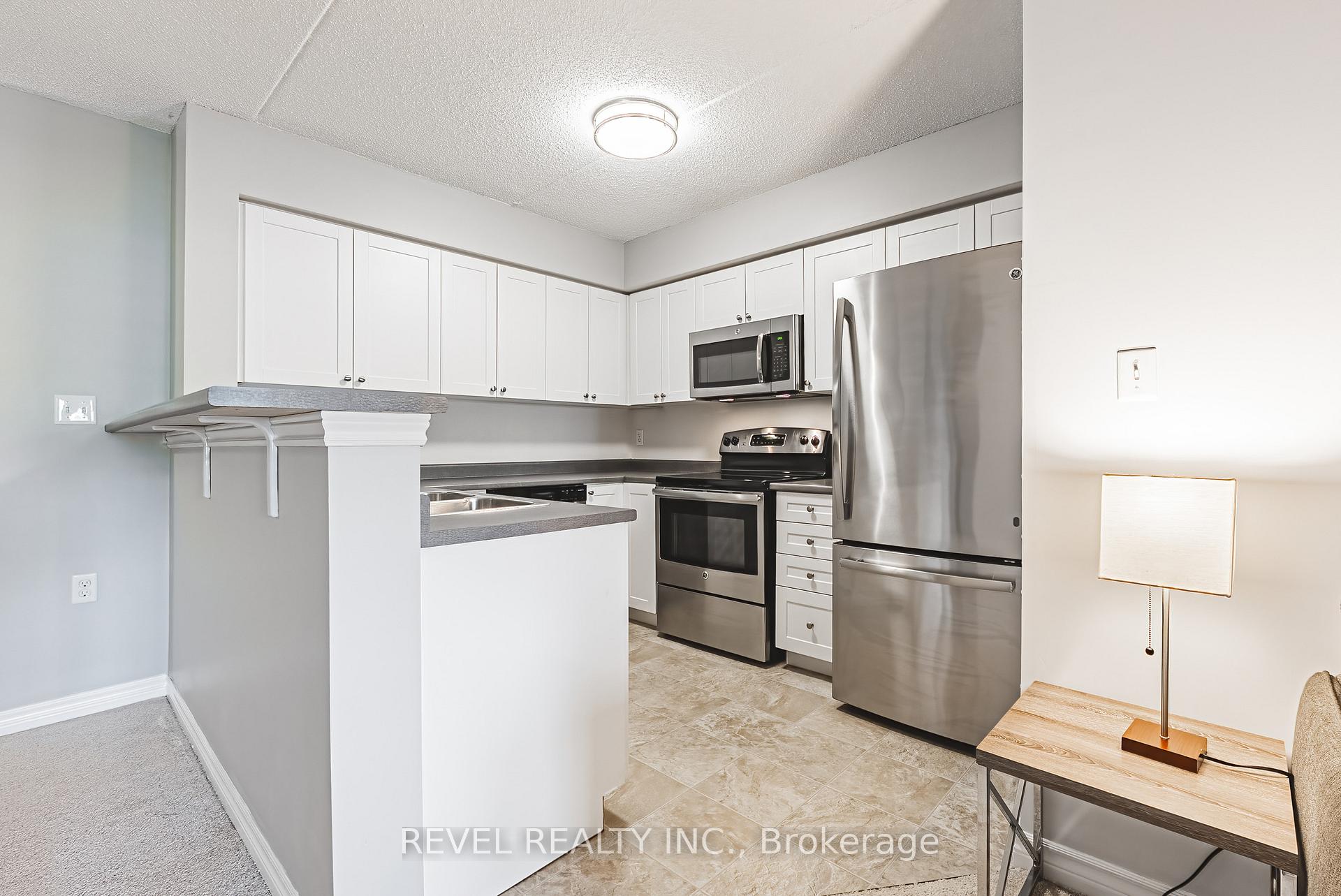Photo 4 of Unit 106, 1450 Main Street E, Milton, Dempsey — HOMEH