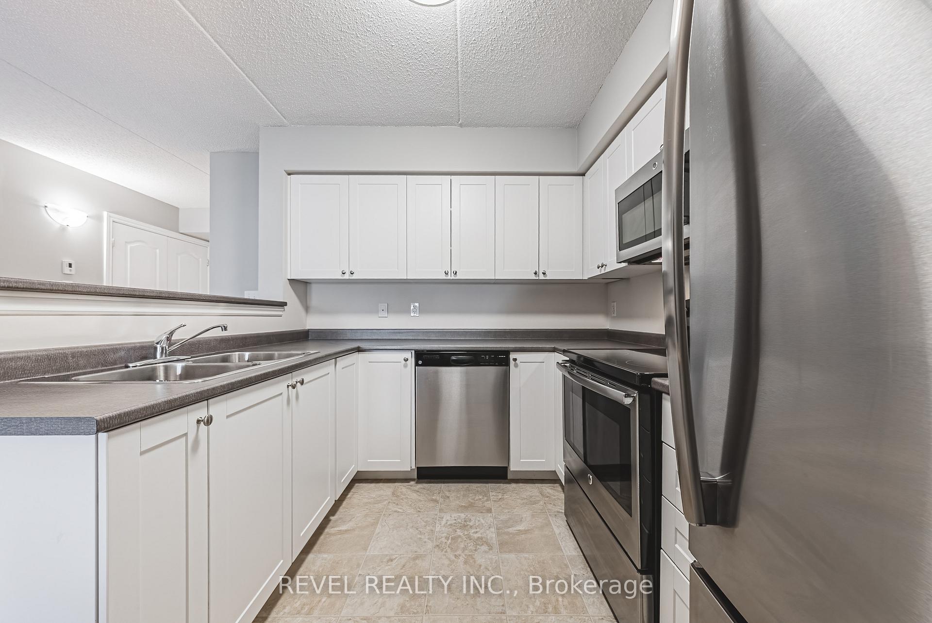 Photo 9 of Unit 106, 1450 Main Street E, Milton, Dempsey — HOMEH