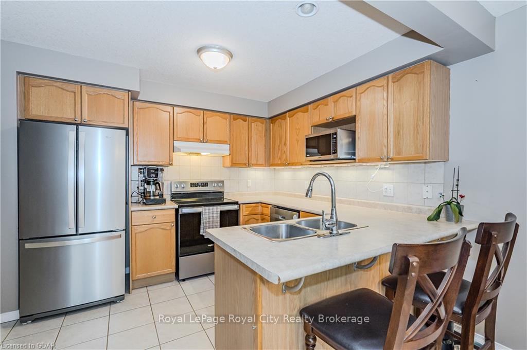 Photo 8 of Unit 40, 31 Schroder Crescent, Guelph, Grange Road — HOMEH
