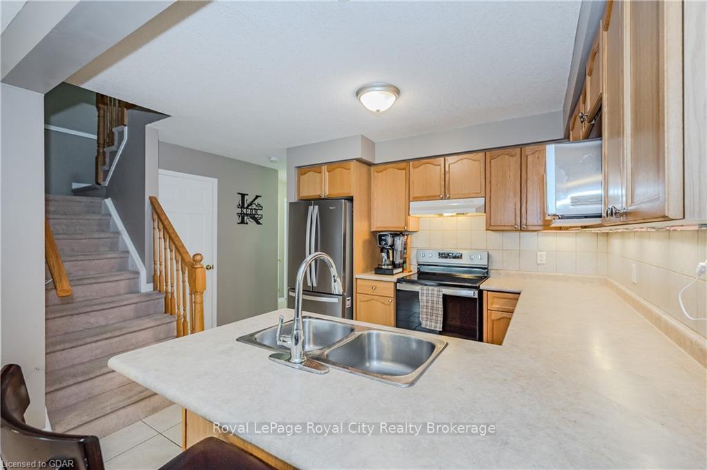Photo 9 of Unit 40, 31 Schroder Crescent, Guelph, Grange Road — HOMEH