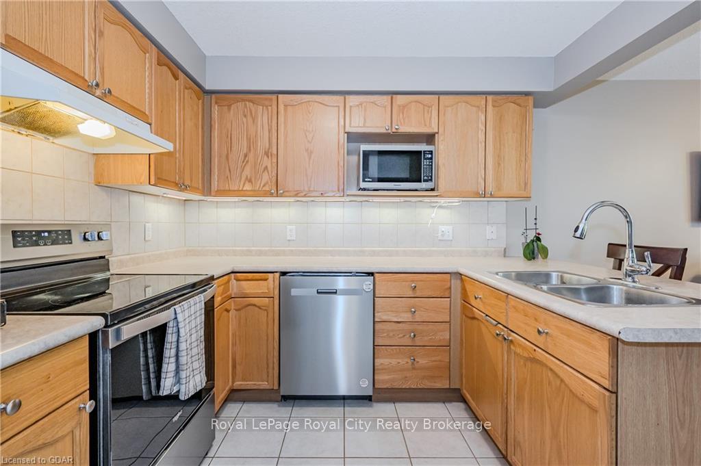 Photo 10 of Unit 40, 31 Schroder Crescent, Guelph, Grange Road — HOMEH