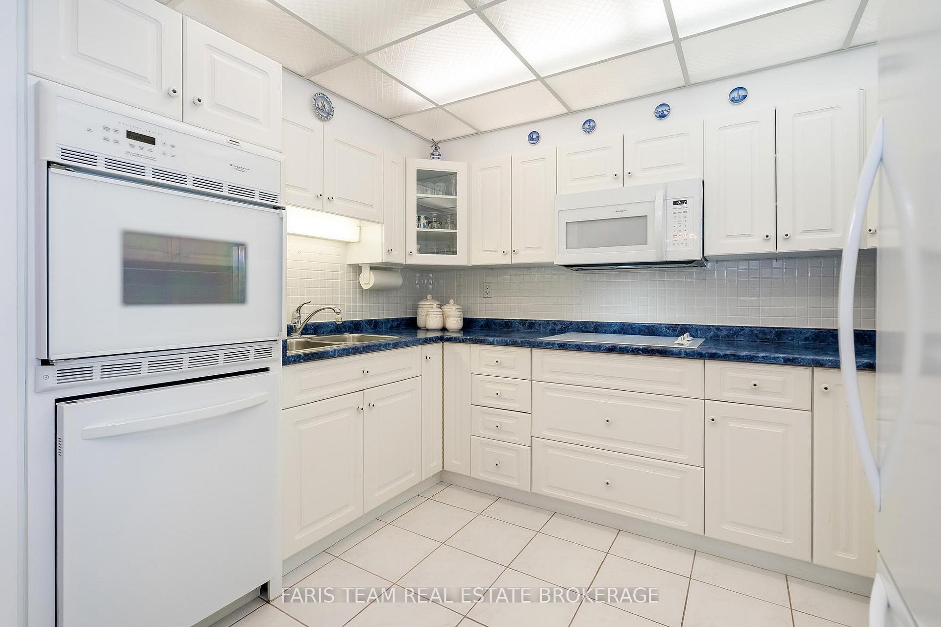 Photo 3 of Unit 703, 181 Collier Street, Barrie, North Shore — HOMEH