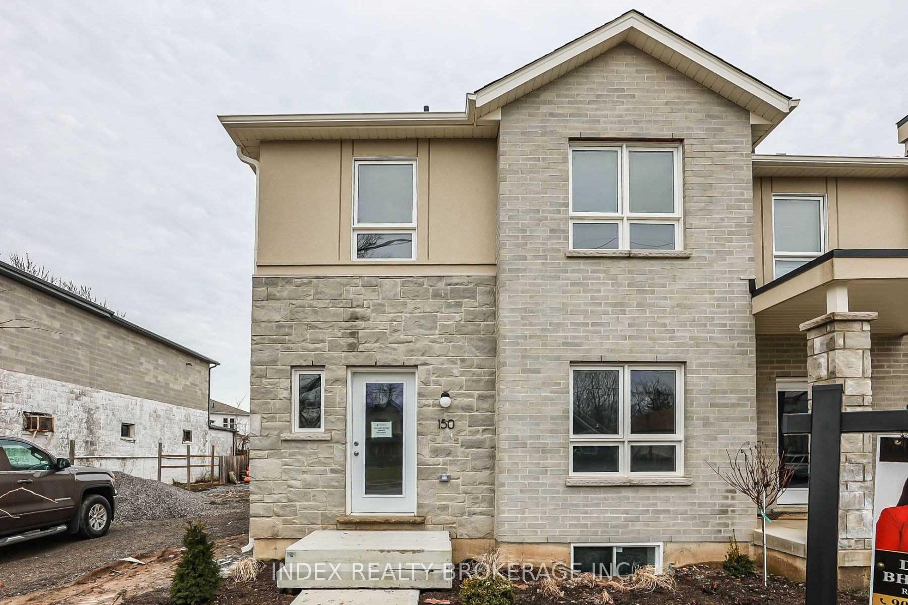 Photo 2 of Unit 1, 150 Broadway, Welland, Broadway — HOMEH