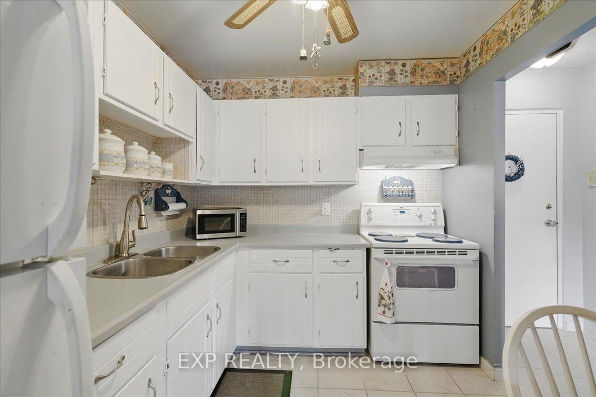 Photo 10 of Unit 306, 131 Taunton Road E, Oshawa, Centennial — HOMEH