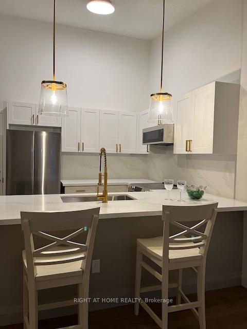 Photo 7 of Unit 409, 1491 Maple Avenue, Milton, Dempsey — HOMEH