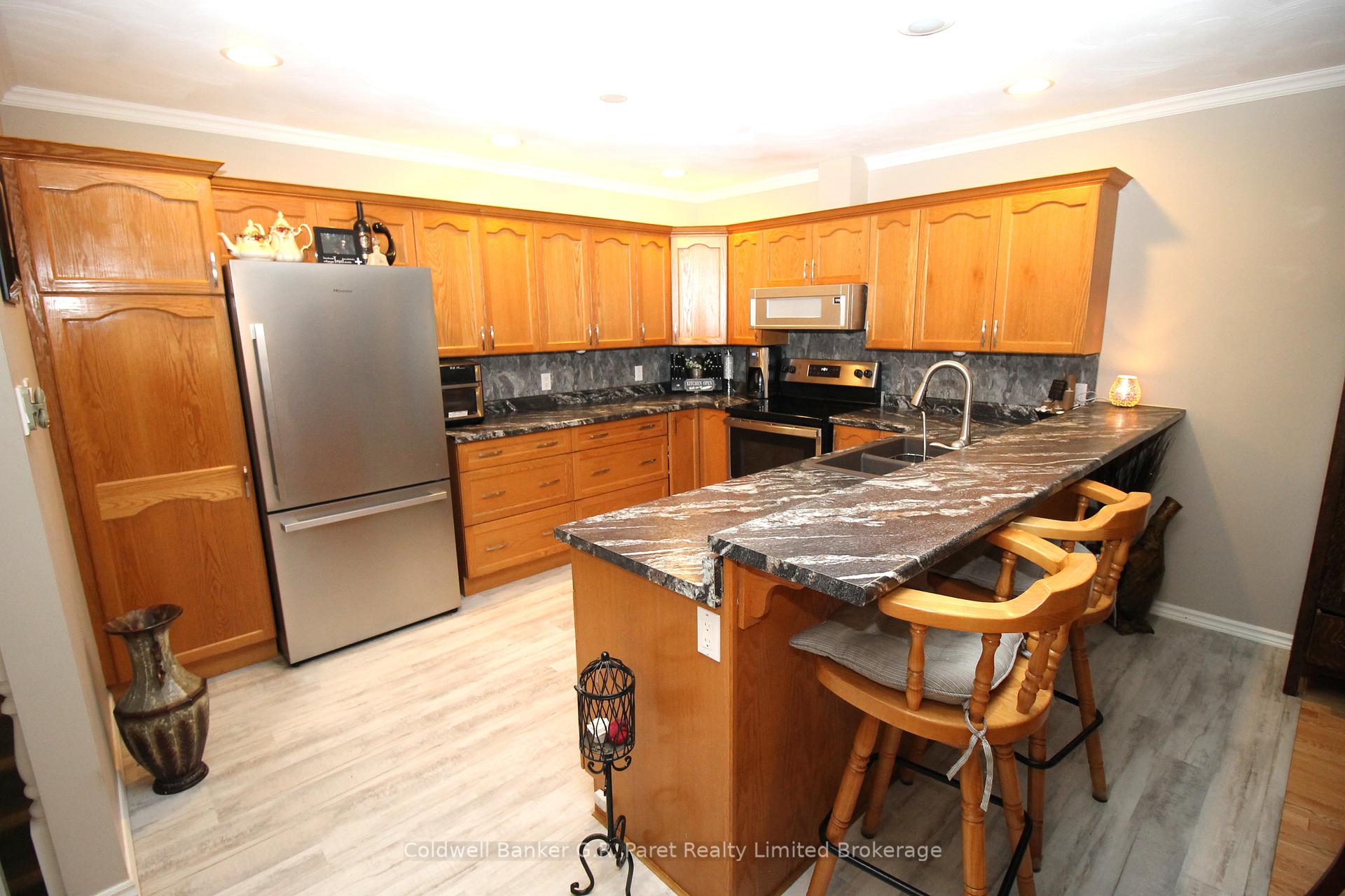 Photo 5 of Unit 5, 150 Oak Street, Norfolk, Simcoe — HOMEH
