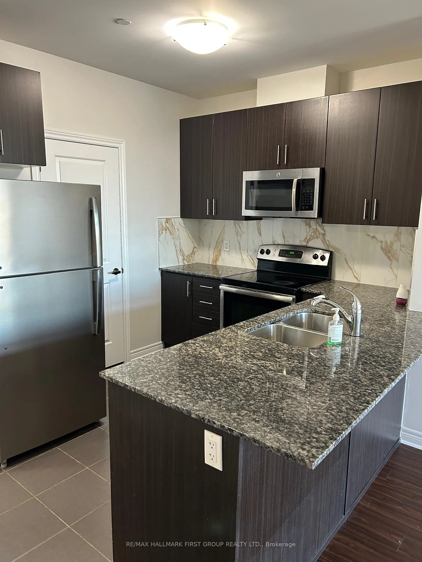 Photo 2 of Unit 310, 7768 Kennedy Road, Markham, Milliken Mills East — HOMEH