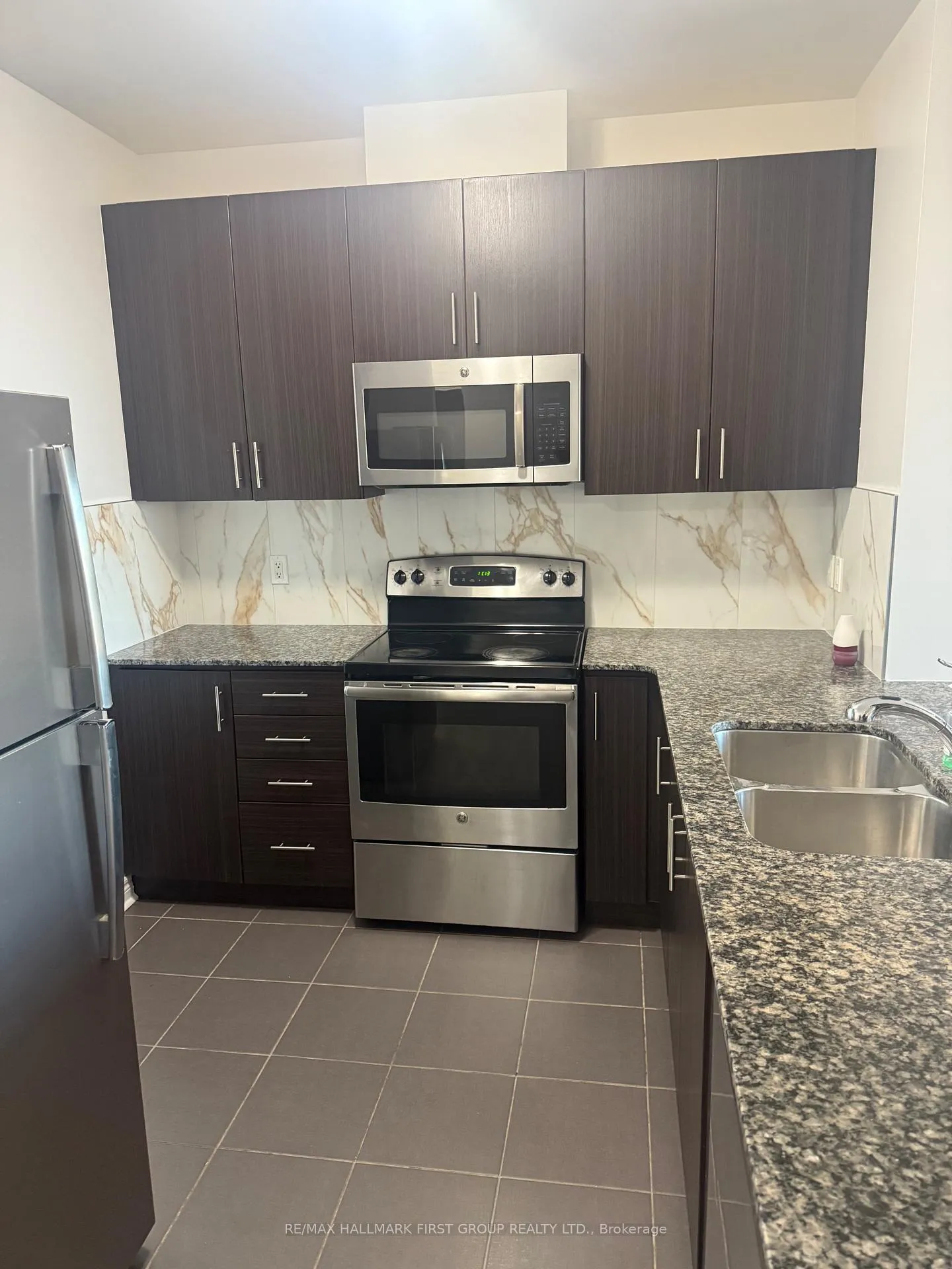 Photo 3 of Unit 310, 7768 Kennedy Road, Markham, Milliken Mills East — HOMEH
