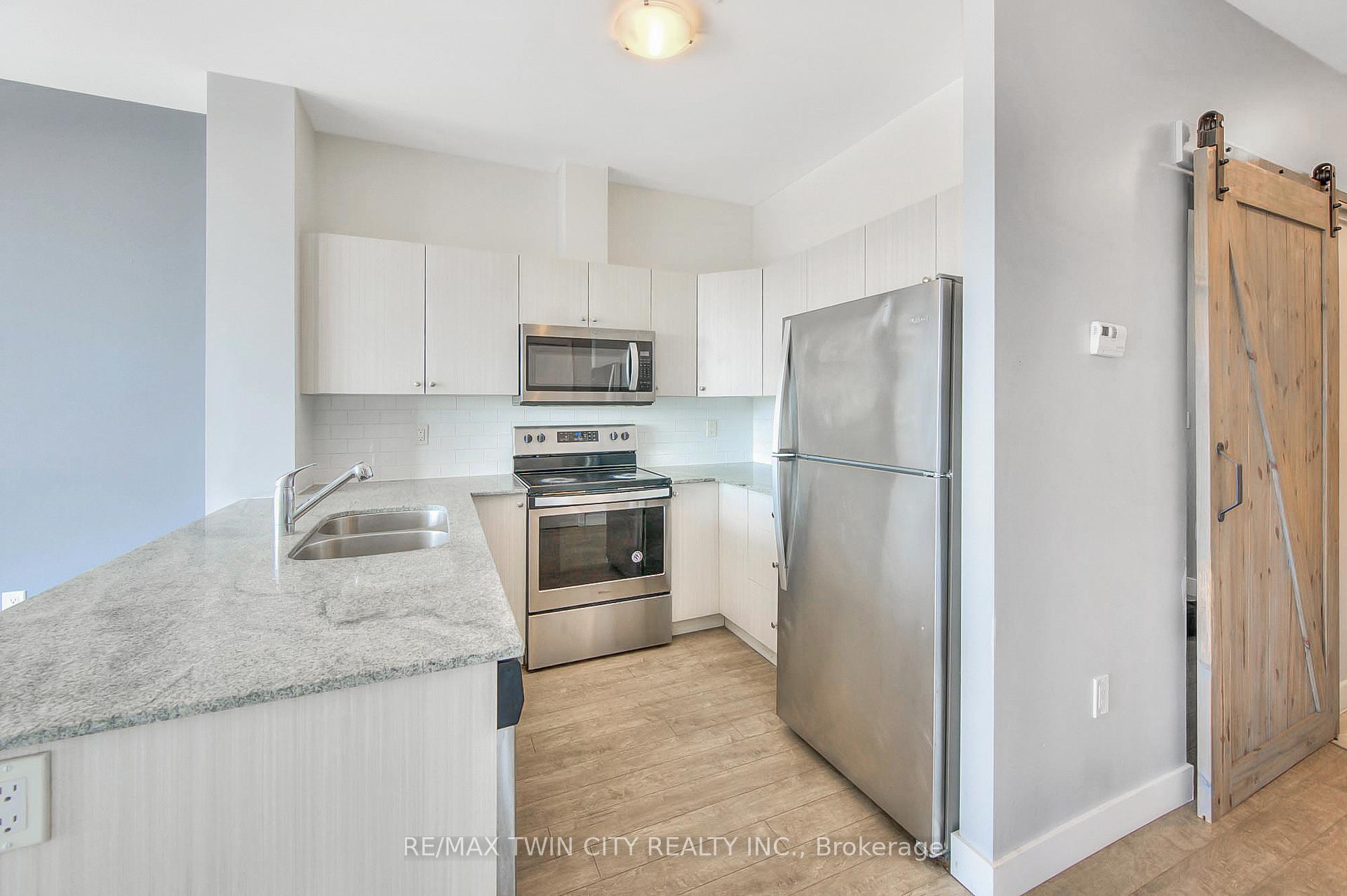 Photo 9 of Unit 1406, 100 Garment Street, Kitchener — HOMEH