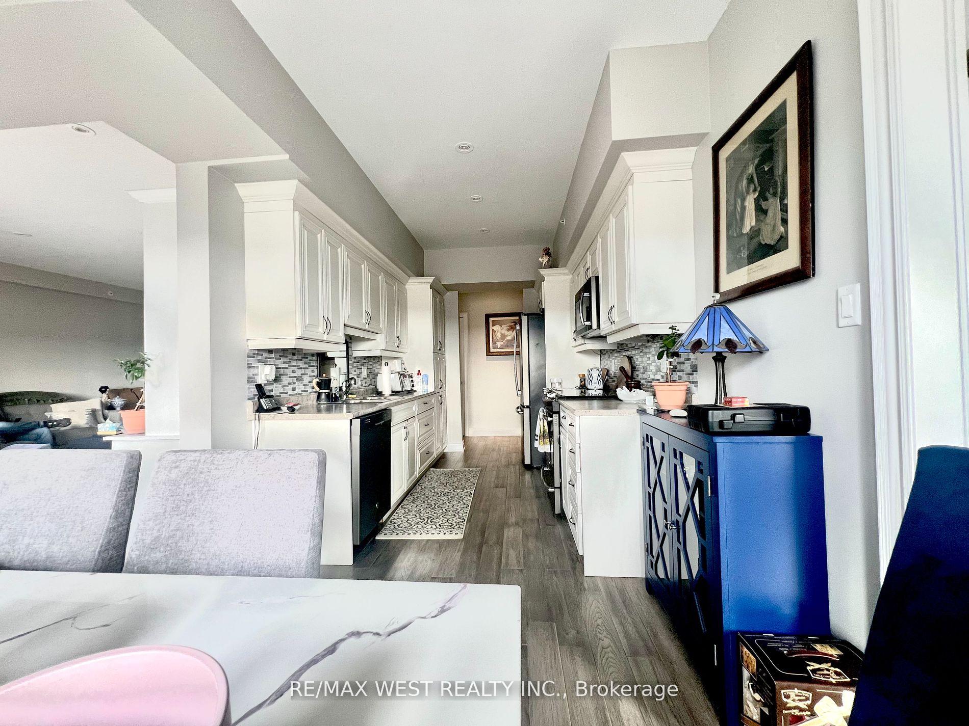 Photo 7 of Unit 402, 720 Yonge Street, Barrie, Painswick South — HOMEH