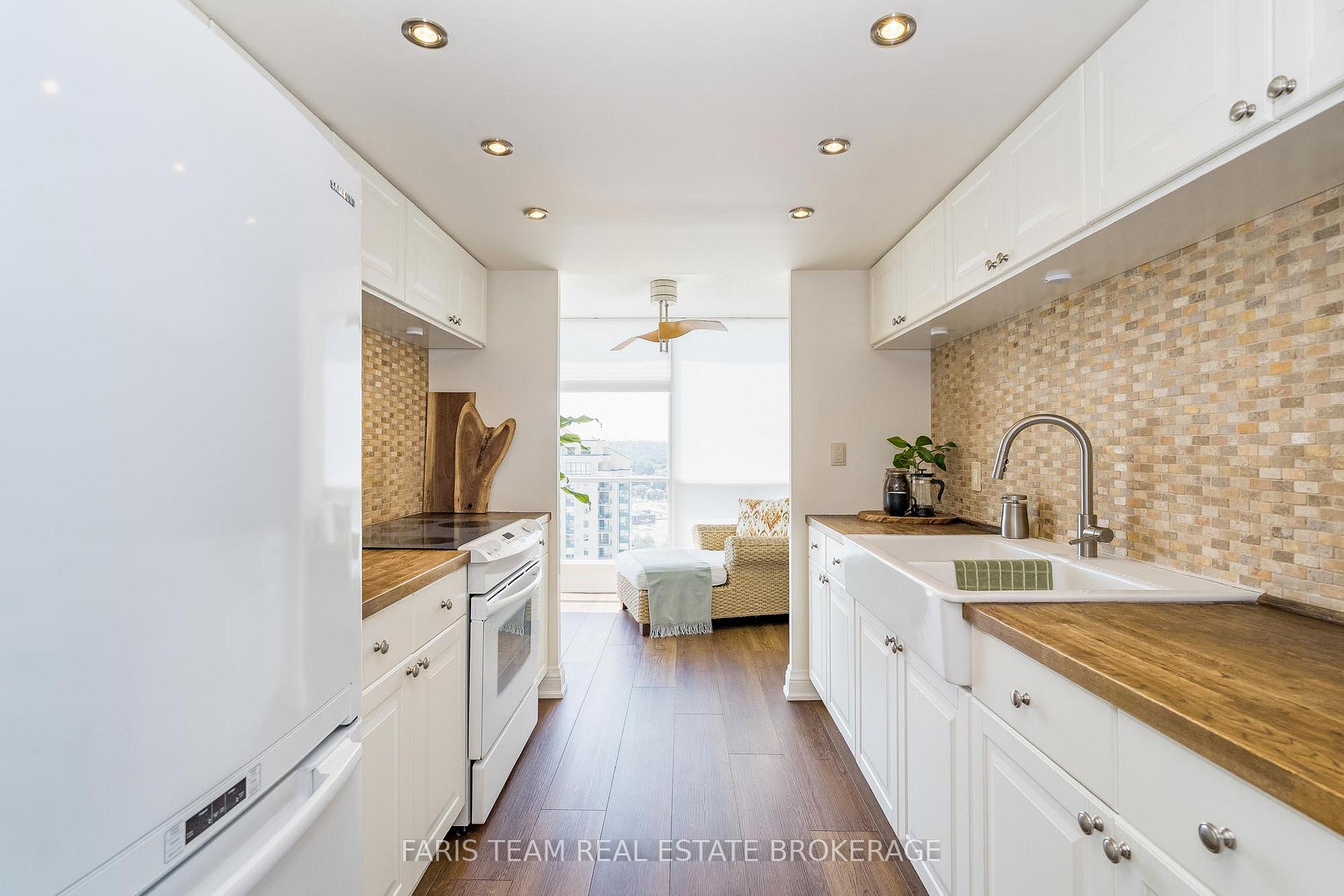 Photo 4 of Unit 1406, 65 Ellen Street, Barrie, City Centre — HOMEH