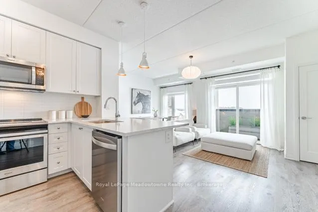 Photo 2 of Unit 422, 610 Farmstead Drive, Milton, Willmott — HOMEH