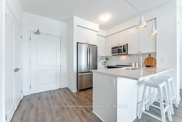 Photo 3 of Unit 422, 610 Farmstead Drive, Milton, Willmott — HOMEH