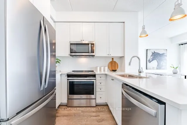 Photo 5 of Unit 422, 610 Farmstead Drive, Milton, Willmott — HOMEH