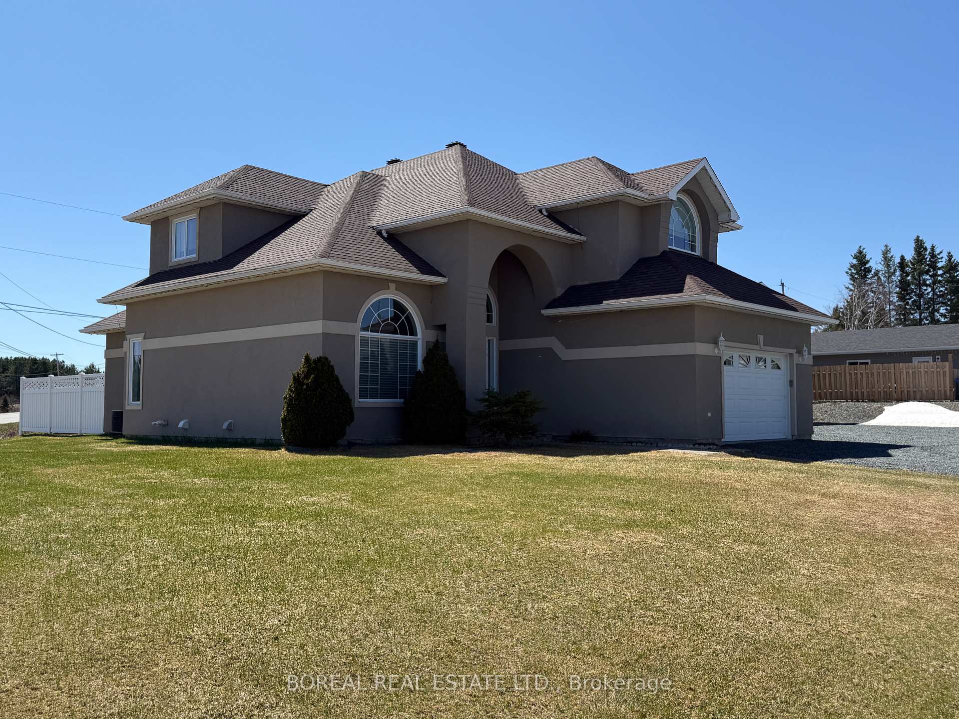 Photo 4 of 66 Huron Road, Cochrane — HOMEH
