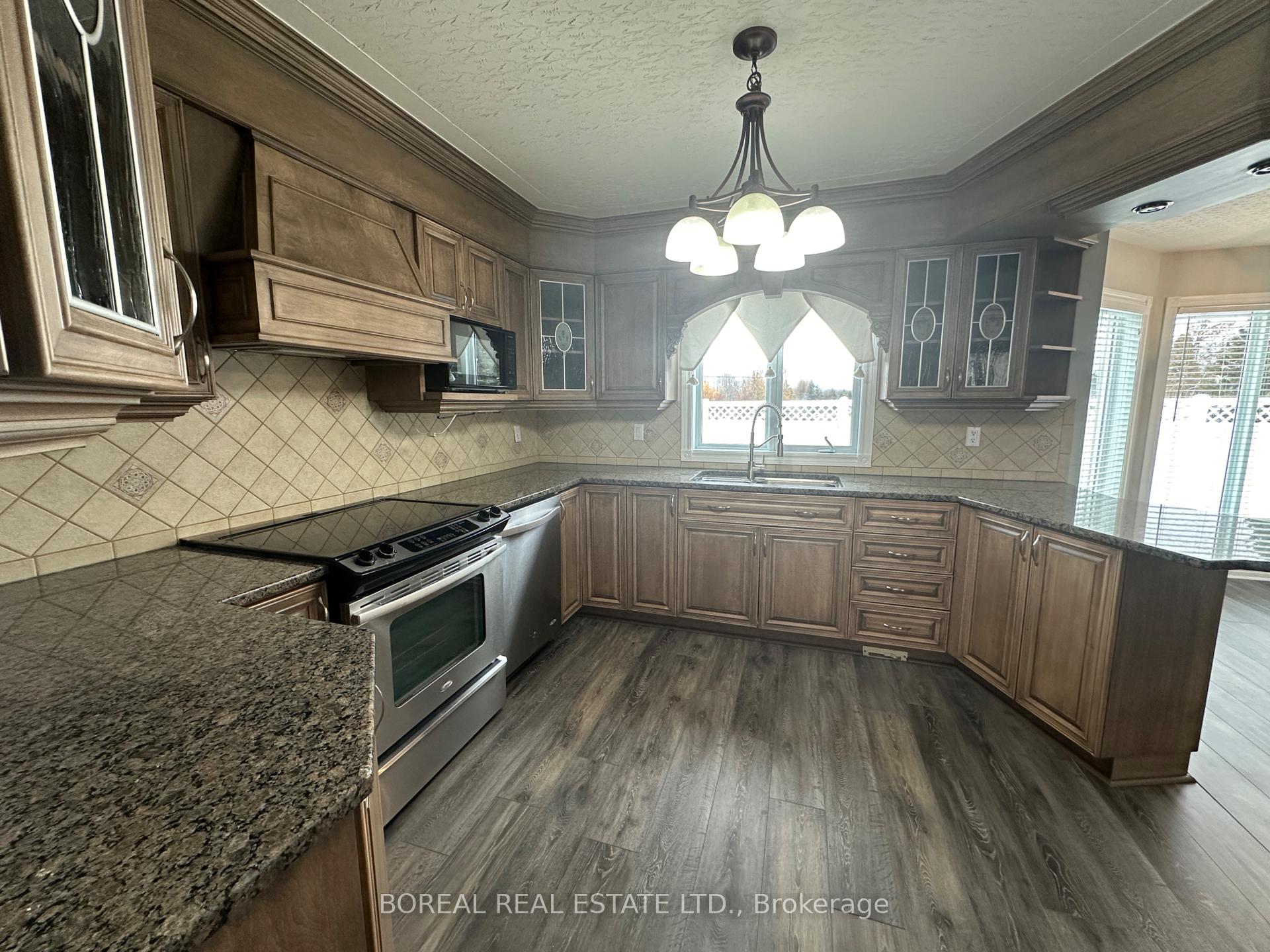 Photo 21 of 66 Huron Road, Cochrane — HOMEH