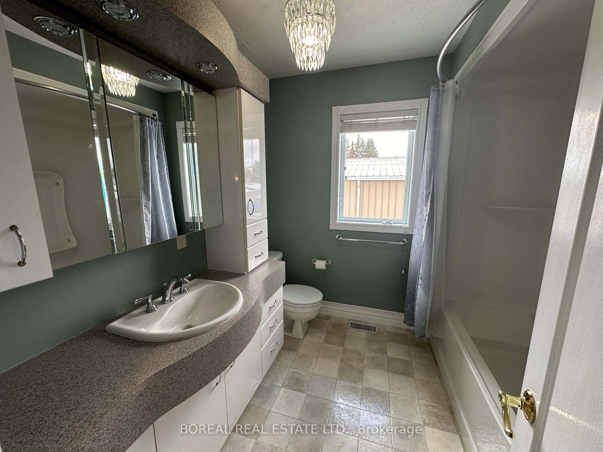 Photo 33 of 66 Huron Road, Cochrane — HOMEH