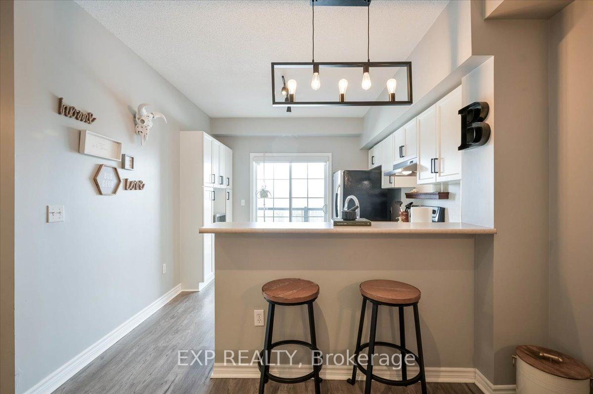 Photo 6 of Unit 407, 308 Watson Parkway N, Guelph, Grange Road — HOMEH