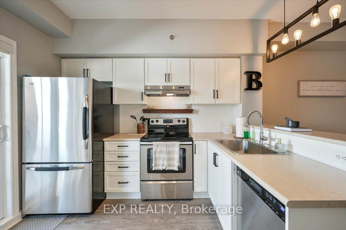 Photo 10 of Unit 407, 308 Watson Parkway N, Guelph, Grange Road — HOMEH