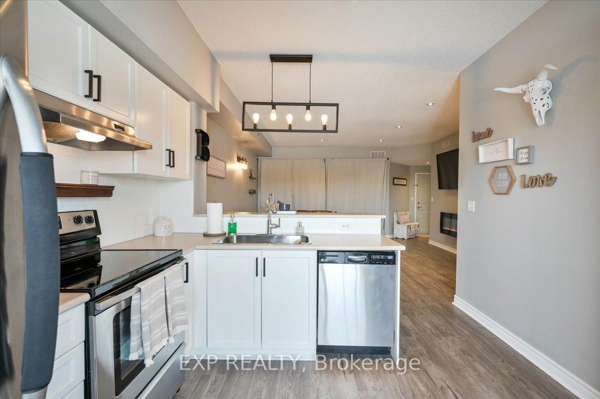 Photo 11 of Unit 407, 308 Watson Parkway N, Guelph, Grange Road — HOMEH
