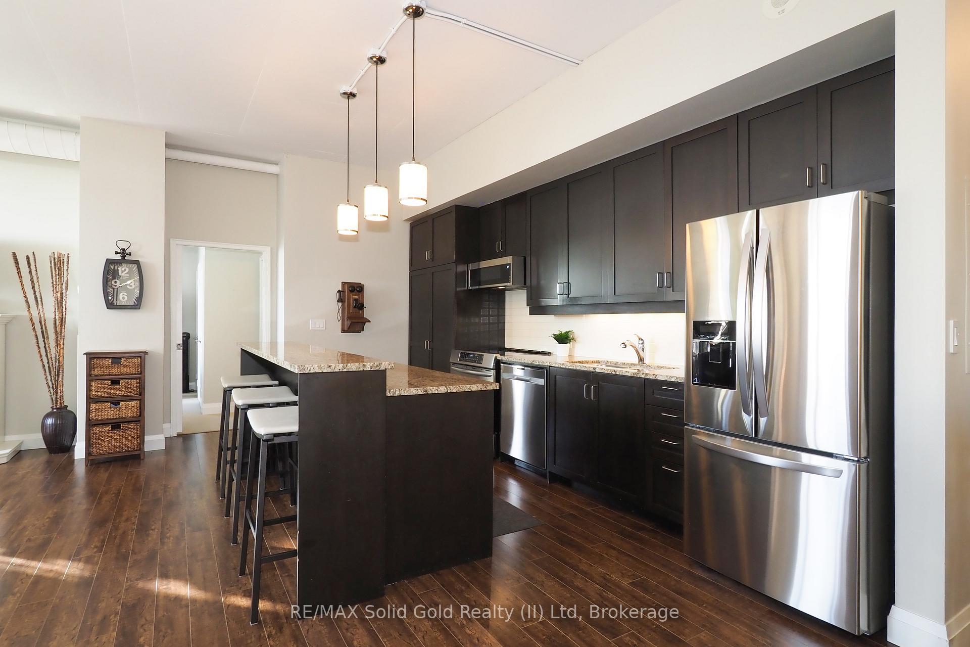Photo 14 of Unit 402, 191 King Street S, Waterloo — HOMEH