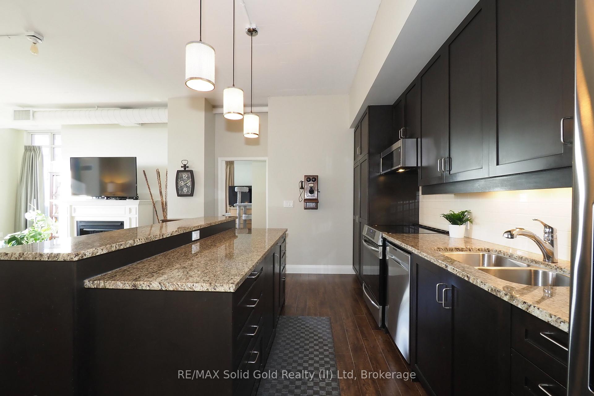 Photo 15 of Unit 402, 191 King Street S, Waterloo — HOMEH
