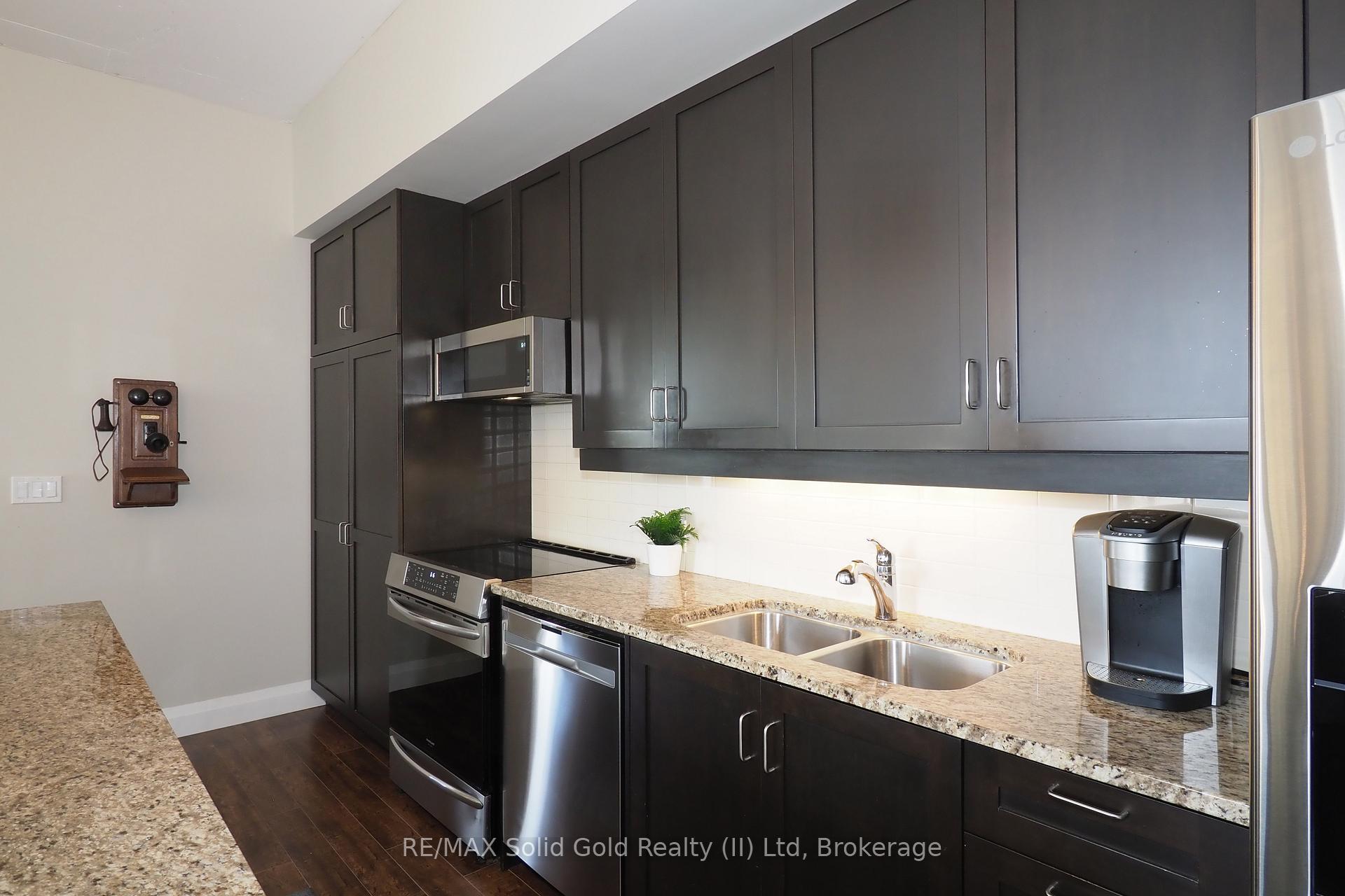 Photo 16 of Unit 402, 191 King Street S, Waterloo — HOMEH