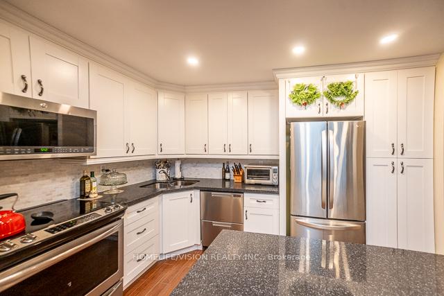 Photo 4 of Unit R1-1, 60 Pavane Linkway, Toronto, Flemingdon Park — HOMEH