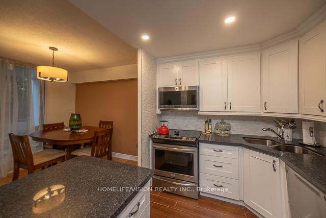 Photo 8 of Unit R1-1, 60 Pavane Linkway, Toronto, Flemingdon Park — HOMEH