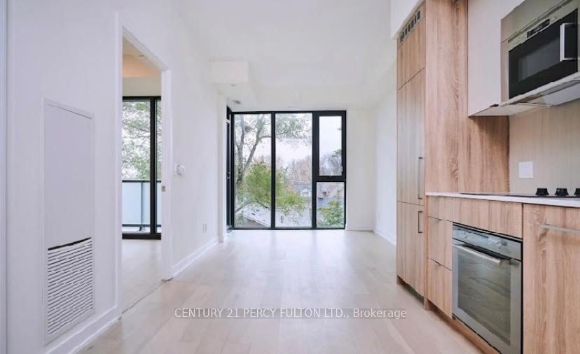 Photo 4 of Unit 605, 840 St Clair Avenue W, Toronto, Oakwood Village — HOMEH