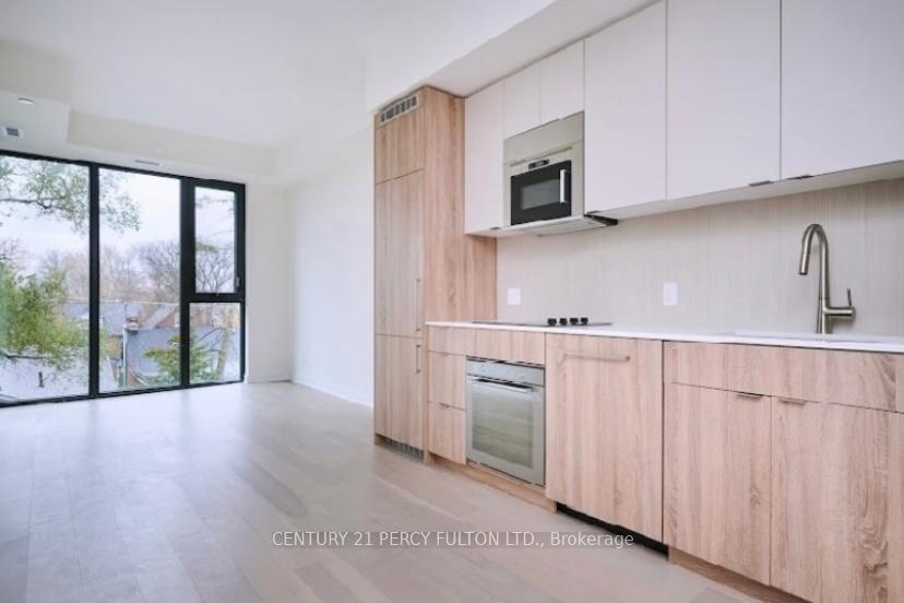 Photo 6 of Unit 605, 840 St Clair Avenue W, Toronto, Oakwood Village — HOMEH