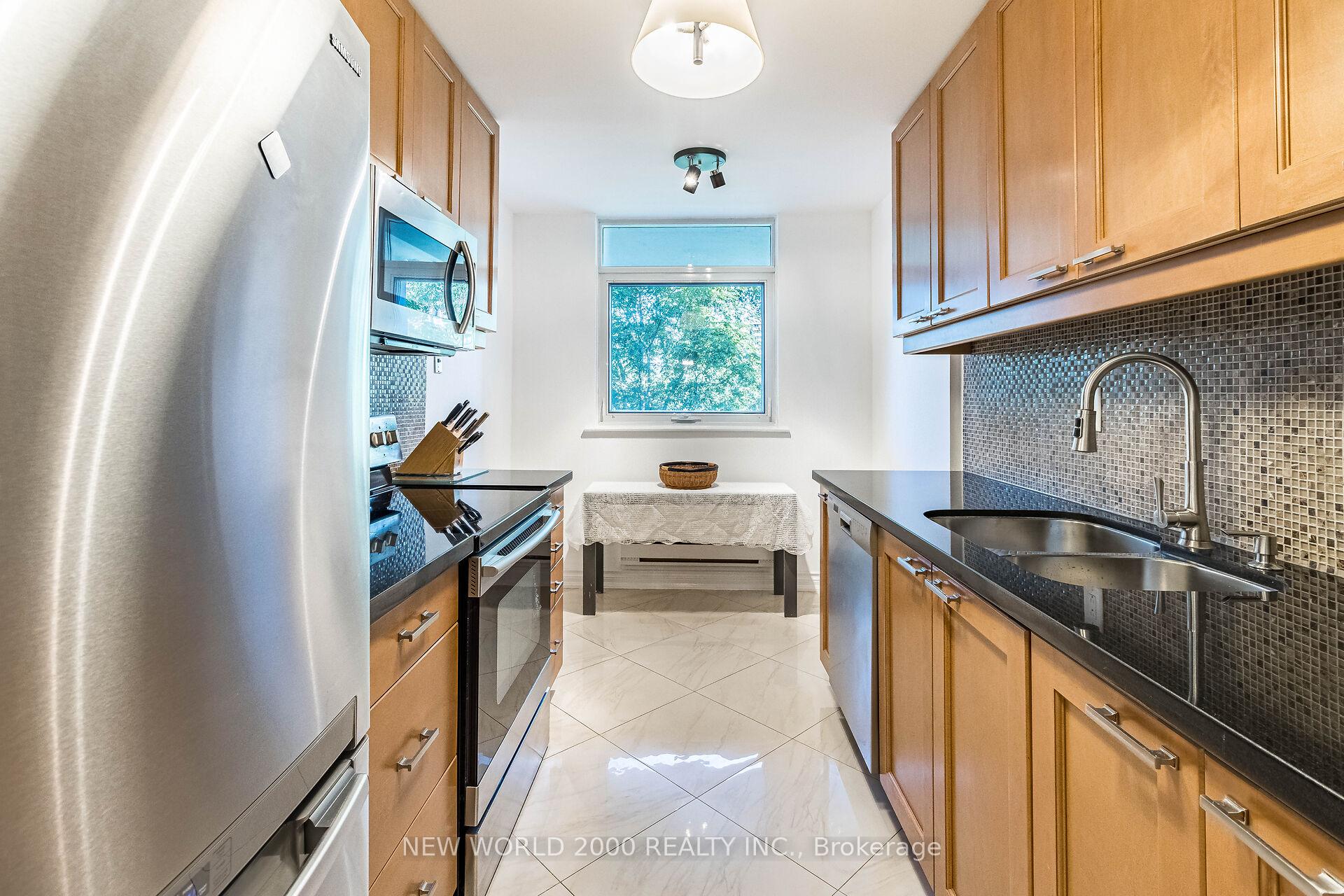 Photo 16 of Unit 410, 7811 Yonge Street, Markham, Thornhill — HOMEH