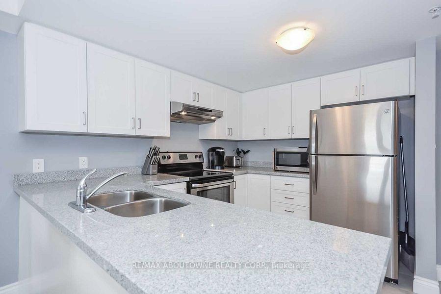 Photo 5 of Unit 402, 64 Frederick Drive, Guelph, Pineridge/Westminster Woods — HOMEH
