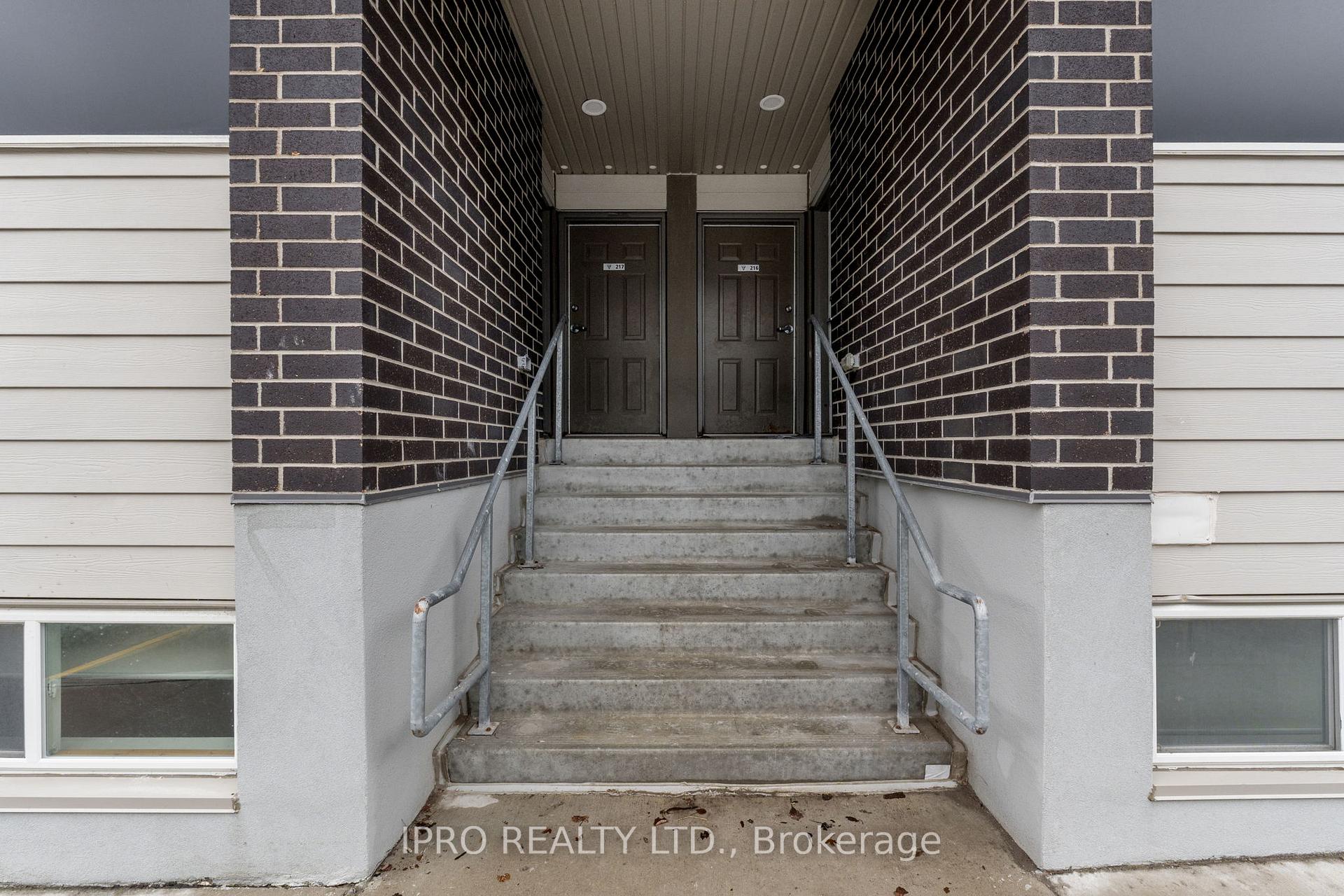 Photo 4 of Unit 117 (level one , unit 17), 338 Albert Street, Waterloo, Lakeshore Village — HOMEH