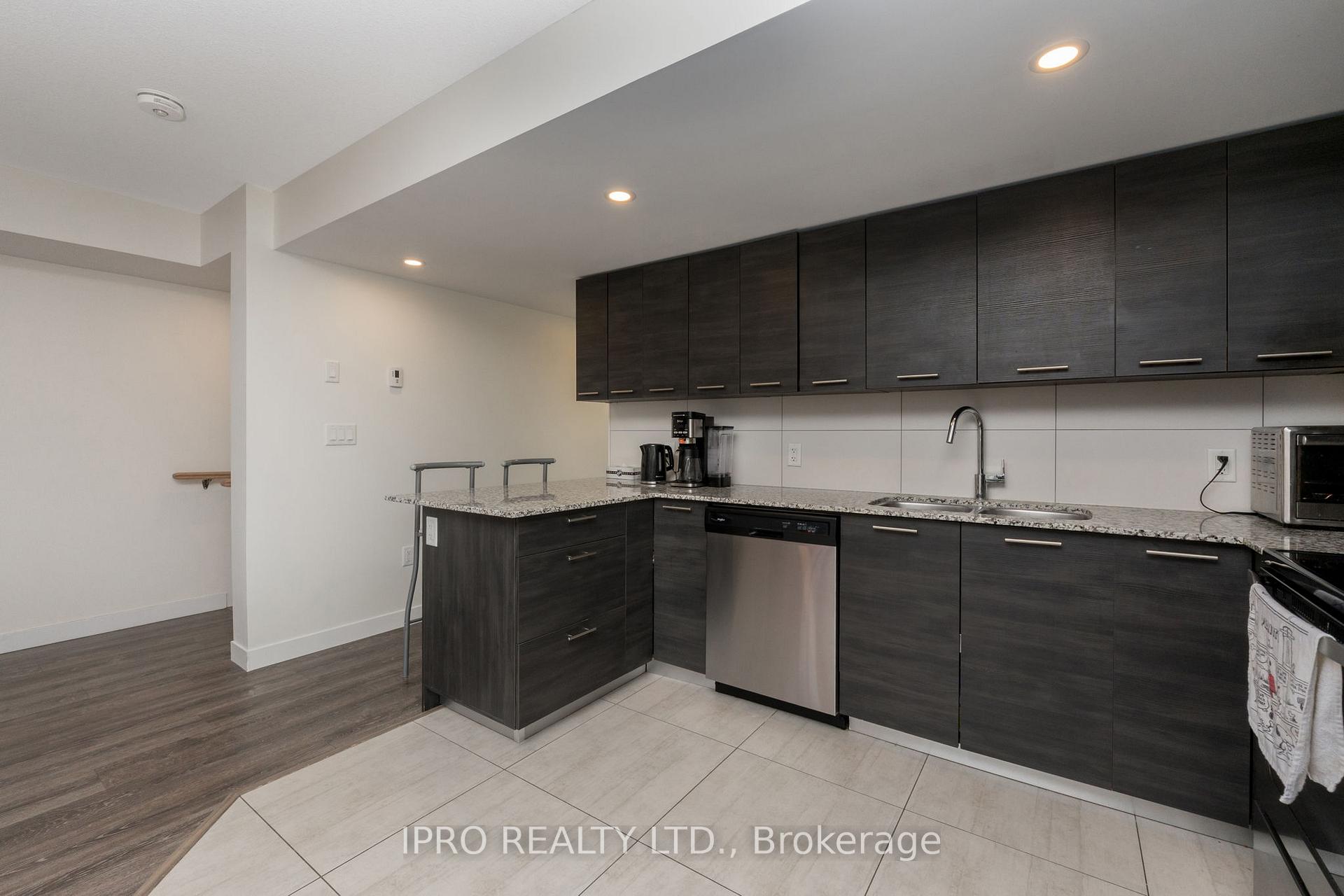 Photo 15 of Unit 117 (level one , unit 17), 338 Albert Street, Waterloo, Lakeshore Village — HOMEH