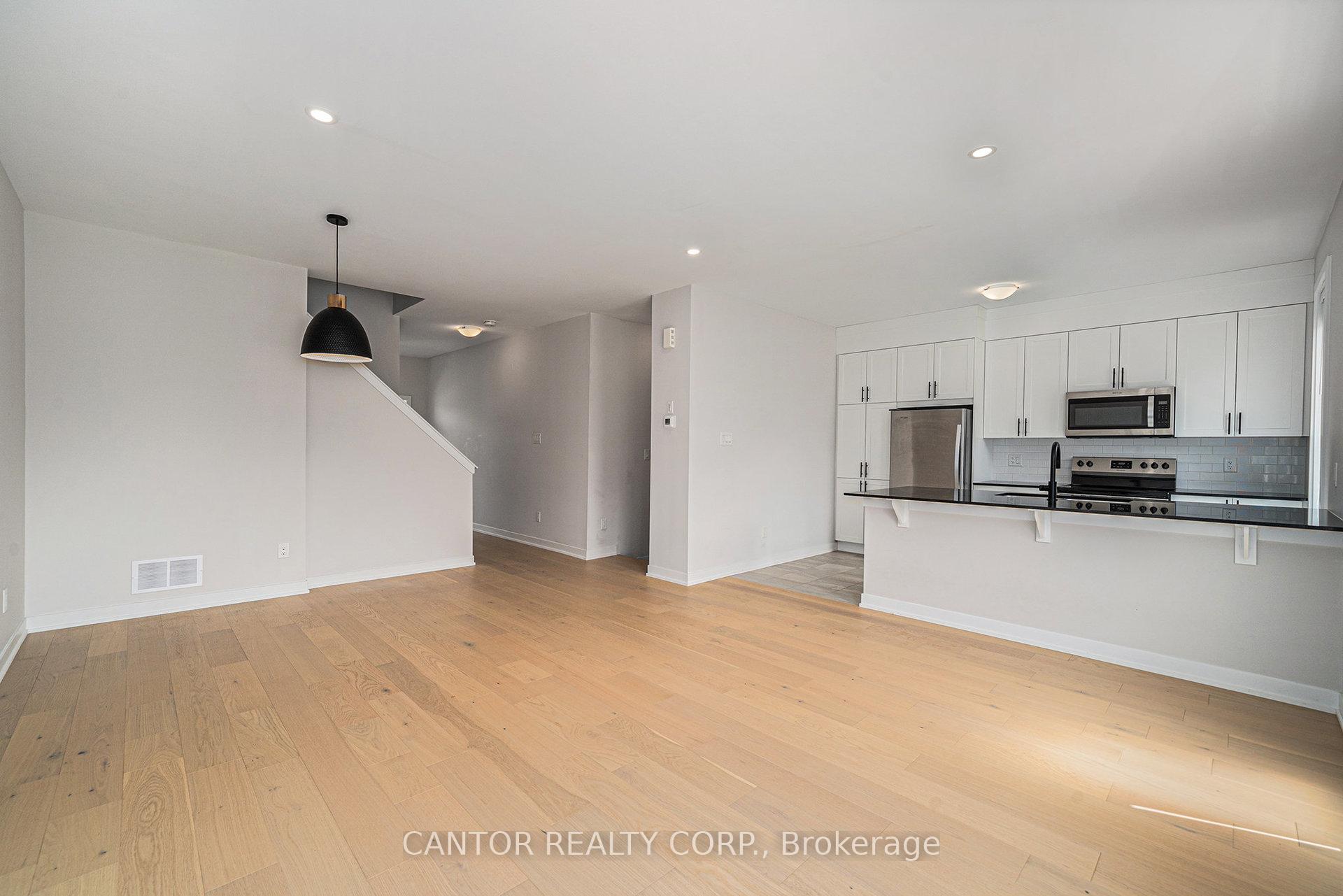 Photo 5 of 22 Focality Crescent, Ottawa, Barrhaven - Half Moon Bay — HOMEH