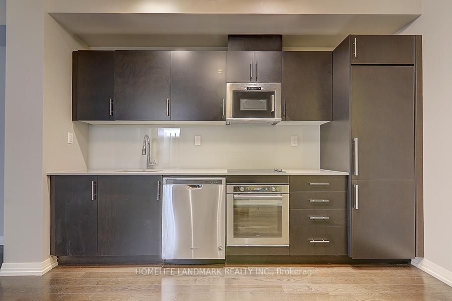 Photo 4 of Unit 701, 460 Adelaide Street E, Toronto, Moss Park — HOMEH