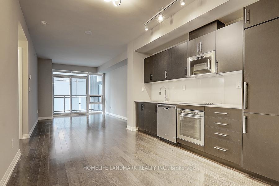 Photo 5 of Unit 701, 460 Adelaide Street E, Toronto, Moss Park — HOMEH