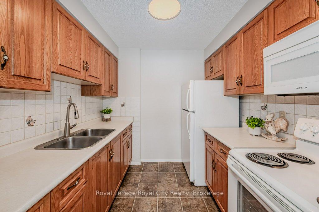 Photo 13 of Unit 206, 358 Waterloo Avenue, Guelph, Junction/Onward Willow — HOMEH
