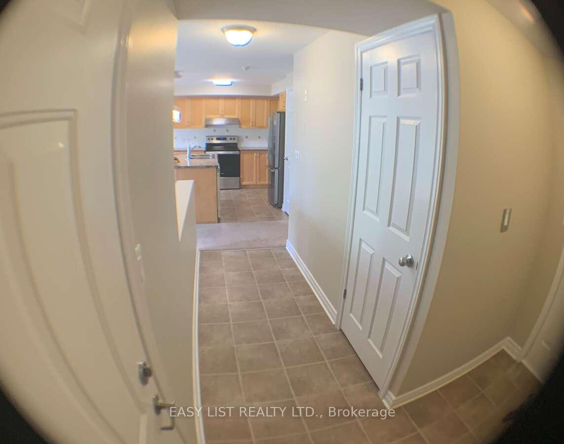 Photo 2 of Unit 4, 500 Stonefield Private, Ottawa, Barrhaven East — HOMEH