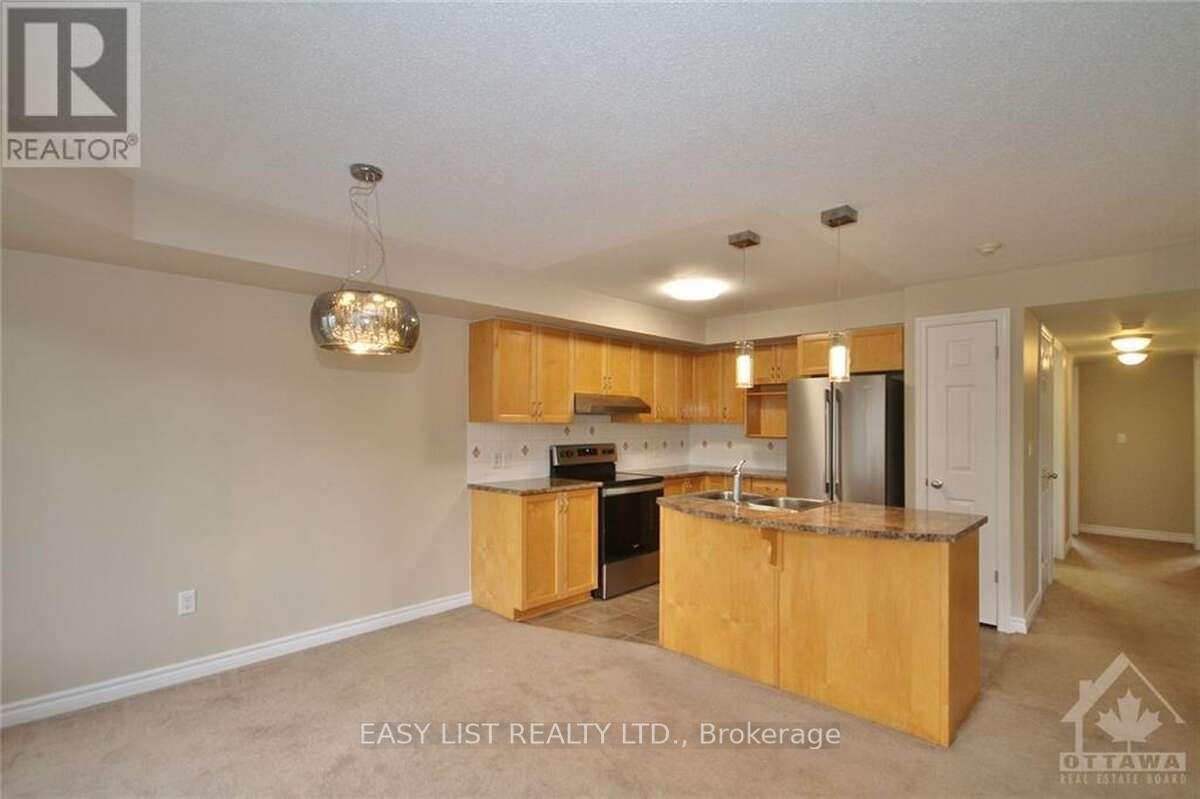 Photo 3 of Unit 4, 500 Stonefield Private, Ottawa, Barrhaven East — HOMEH