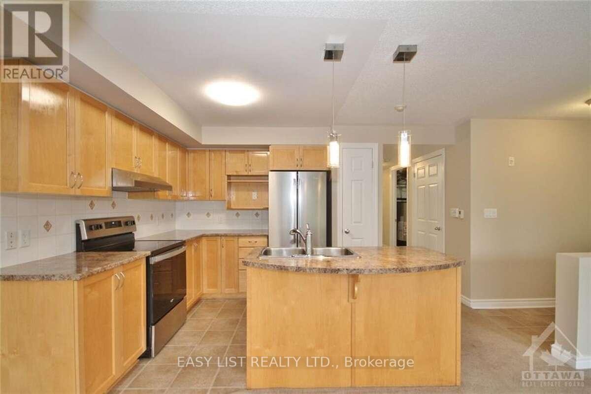 Photo 5 of Unit 4, 500 Stonefield Private, Ottawa, Barrhaven East — HOMEH