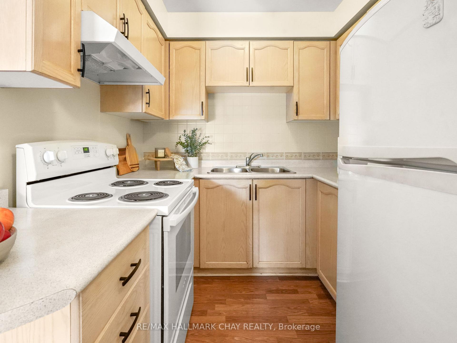 Photo 12 of Unit 202, 247 King Street N, New Tecumseth, Alliston — HOMEH