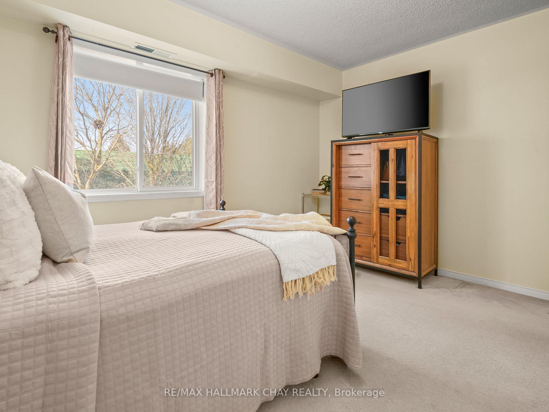 Photo 23 of Unit 202, 247 King Street N, New Tecumseth, Alliston — HOMEH