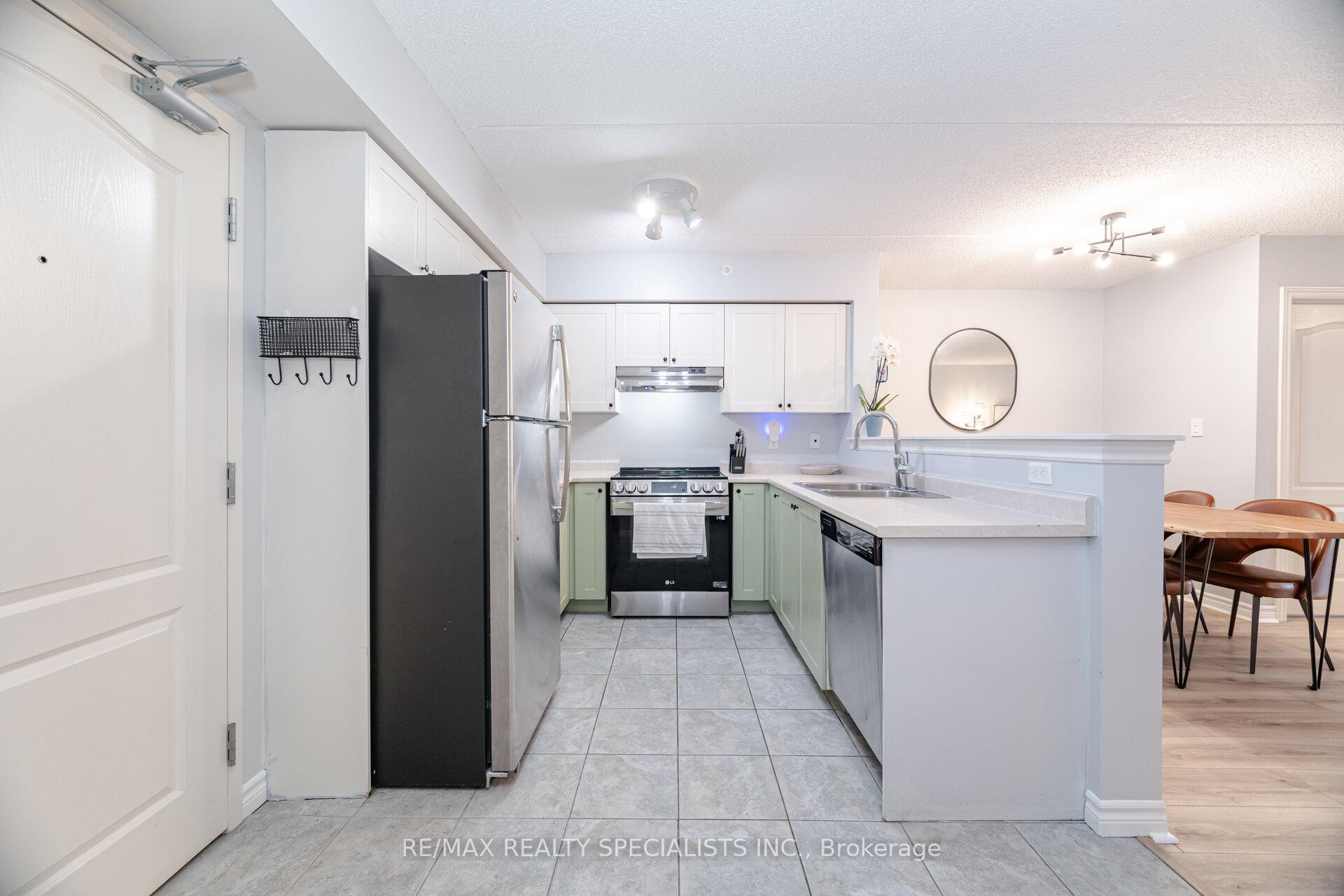 Photo 2 of Unit 214, 1450 Main Street E, Milton, Dempsey — HOMEH