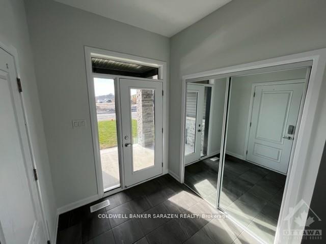 Photo 2 of 561 Aglish Mews, Ottawa, Barrhaven - Half Moon Bay — HOMEH